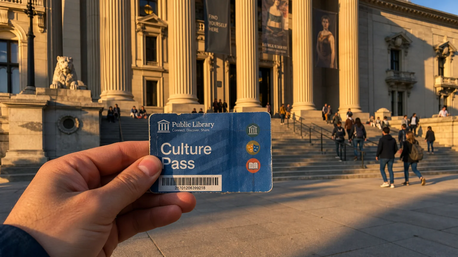 A first-person view of a hand holding a library culture pass in front of a grand museum entrance.
